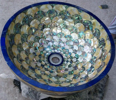 Stunning Abalone Shell Bathroom Sink Featuring Mother Of Pearl Finish, glossy vessel basin, detailed interior view.