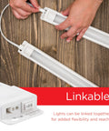 Hands connecting 36 Inch Plug-In Linkable Under Cabinet Light Bar With High Low Off Switch, Warm 2700K LED Kitchen Lighting, 1150 Lumens.