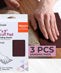 Person using Maroon 6 By 9 Inch Scuff Pads For Paint Prep Aluminum Oxide Surface Prep Cloths with product packaging