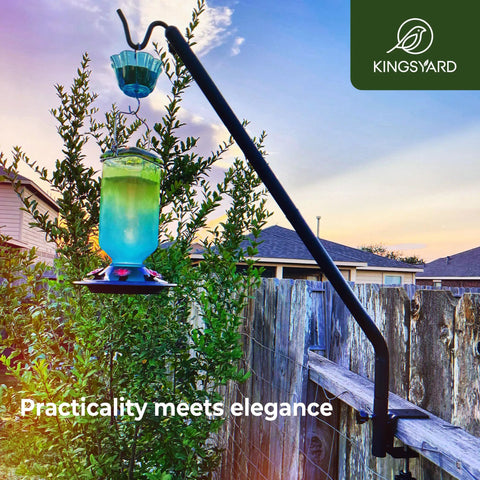 Dang Sturdy Telescoping Deck Rail Hook Adjustable From Twenty Seven To Thirty Nine Inches holding a colorful bird feeder outdoors.