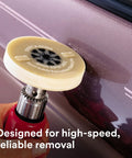 Eraser Wheel Adhesive Remover For Decals And Vinyl 4 Inch Diameter 5/8 Inch Thick attached to drill