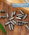24 Pack Heavy Duty Nickel Plated Shelf Pegs 5mm Metal Shelf Support Pins For Bookshelves Cabinets And Closets on wooden surface.