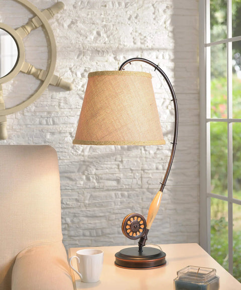 Fly Rod Table Lamp in Oil Rubbed Bronze With Wood Accent Finish, Rustic Lodge Style, 27.5 Inch Tall Drum Shade on side table