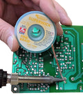 Desoldering Solder Wick No Clean Fine Braid With RMA Flux Pro Grade Copper Solder Wick 5 Ft Length 0.075 Inch Width in use on PCB