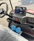 Interior view of Red 48 Volt 105 Ah Lithium Electric Golf Cart With Spacious Built In Insulated Cooler, featuring steering wheel and display.