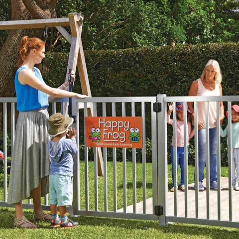 Straight Up Tough Top Pull Pool Safety Gate Latch With Audible Alarm Feature Keeps Kiddos Secure While Giving Homeowners Zero Hassle Installation And Weatherproof Year Round Guarding Black installed at a childcare facility.
