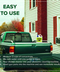 Ultrasonic gun cleaner bottle (128 oz) on green pickup truck tailgate outdoors.