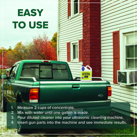 Ultrasonic gun cleaner bottle (128 oz) on green pickup truck tailgate outdoors.