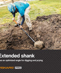 Person using 60-Inch Pro Garden Shovel For Digging, Heavy-Duty Steel Spade With Straight Handle to pry stone from soil