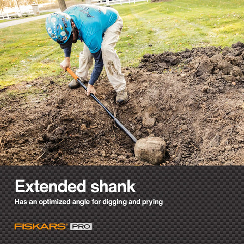 Person using 60-Inch Pro Garden Shovel For Digging, Heavy-Duty Steel Spade With Straight Handle to pry stone from soil