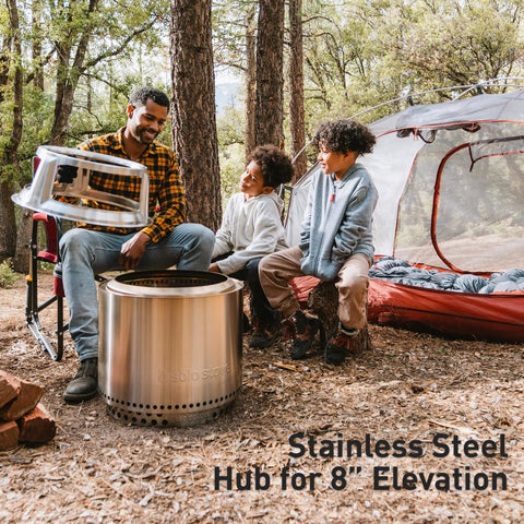 Family with Bonfire Cast Iron Grill Cooking Bundle 2.0 With Smokeless Fire Pit Stand Hub And Removable Ash Pan camping