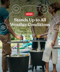 Modern Outdoor Bar Table With Built In 7.5 Gallon Beer And Wine Cooler For Backyard Gameday Parties And Poolside Hangouts A Portable Pop Up Bar With Hidden Cooler Lid Lifts For Quick Drinks On The Deck And Chill Vibes Dark Grey with people enjoying drinks outdoors.