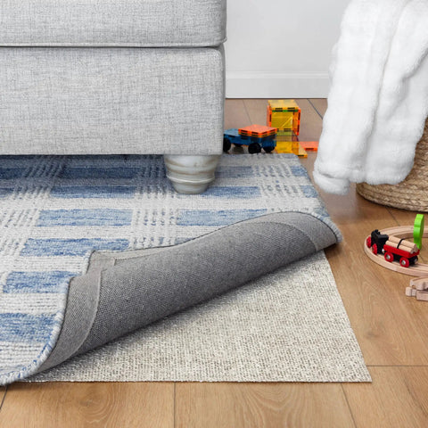 Nature's Grip Stays Put Non Slip Rug Pad 2x6 Feet 1/16 Inch Thick Rubber and Jute Eco Friendly Underlayment under blue area rug