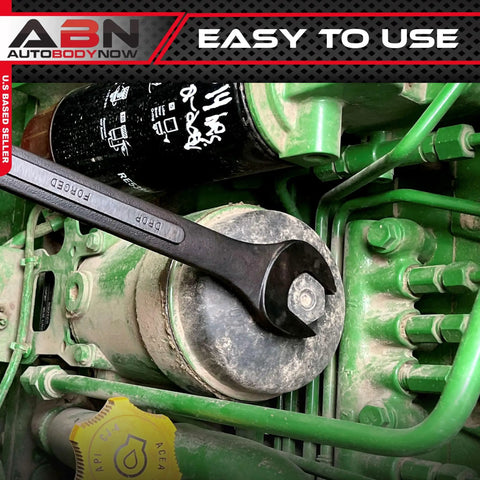 SAE open-end wrench in use on engine, part of Sixteen Piece SAE Wrench Set With Roll Up Pouch One Quarter Inch To One And A Quarter Inch Open End And Box End Wrenches Built For DIYers 12 Point Thin Wrenches For Extra Clearance Angled Fifteen Degree Offset For Maximum Torque