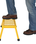 Person using Aluminum 1 Step Wide Stand With 500 Lb Capacity In Bright Yellow For Industrial And Commercial Use, Lightweight Yet Durable