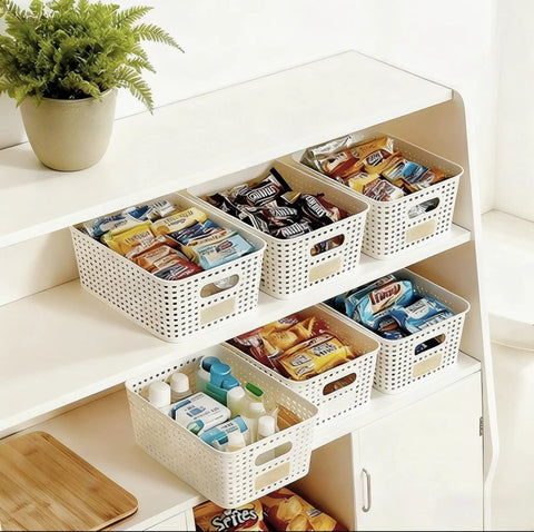 Six Pack Stackable Plastic Storage Bins With Lids And Bamboo Lid holding snacks and toiletries on white shelves