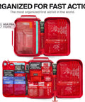 Open large waterproof first aid kit for car, travel, home and outdoors with IPX7 sealed zippers, showing various medical supplies.
