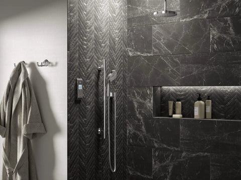 Modern bathroom with Awaken 8 Inch Single Function Rain Showerhead, polished chrome, mounted on dark textured tile wall.