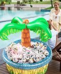 Inflatable 28 Inch Palm Tree Cooler For Beverages, Beach Luau Themed Party Decor And Tropical Outdoor Supplies, filled with cans by pool