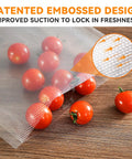 Quart Vacuum Sealer Bags For Food 8 By 12 Inches 50 Count BPA Free Thick Bags sealing tomatoes on wood surface