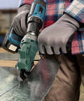 Close-up of Snapper Shear Drill Attachment cutting 18-gauge galvanized steel, showing 360-degree rotating head in use.