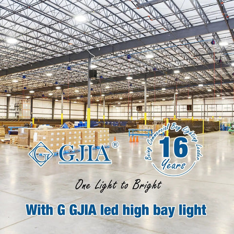 Spacious warehouse illuminated by 150W LED High Bay Light UFO Style 22500 Lumens 5000K with industrial ceiling setup.
