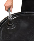 Hand using Chrome Vanadium Drum Impact Socket For One Half Inch Ratchet Drive Opens Two Inch And Three Quarter Inch Drum Plugs