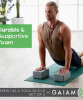 Kick Your Practice Up With This Game Changer Yoga Block Built From Lightweight EVA Foam With A Nonslip Grip And Rounded Beveled Edges That Keep You Balanced Through Pilates Vibes in use during a workout.
