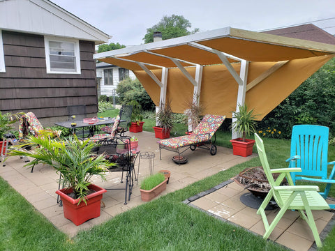Outdoor patio scene with Heavy Duty Waterproof Vinyl Tarp With Rustproof Grommets For Truck Covers And Construction Work Outdoor Protection