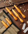 Top Notch 5 Piece Linoleum Carving Tool Set Featuring Knockout Sharp Triangular Linocut Knives With Smooth Beechwood Handles And Protective Rubber Caps for precision art.