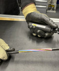 Technician using Hard Cable Jacket Strippers For Pros Portable Electrician Tool on multi-colored cables