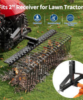 Heavy Duty Tow Behind Landscape Rake For Tractor ATV And UTV With Seventeen Powder Coated Steel Tines And A Two Inch Receiver Hitch attached to a tractor.