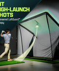 Elite Golf Net With LoftGuard Canopy And Steel Frame 8 By 8 Foot Practice Hitting Net For Indoor And Outdoor Use Built For High Launch Shots Wedge Gapping And Consistency shown in use indoors with golfer swinging.