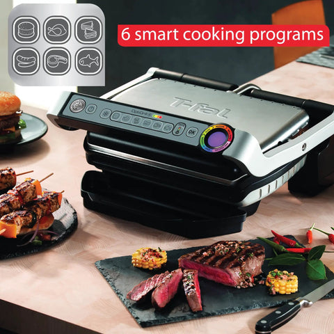 T-Fal OptiGrill Indoor Panini Press With Smart Sensor Tech, Six Auto Cooking Programs For Perfect Thicker Cuts displayed with grilled steaks.