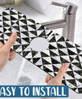 Go To Sink Mat With Faucet Splash Guard being installed, showing mosaic texture, super absorbent diatom mud, 15.5 x 5.5 inches behind faucet.