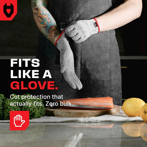 Person wearing Premium Cut Resistant Kitchen Gloves Level 5 Food Grade For Chefs And Butchers, Ideal For Mandolines And Oyster Shucking.