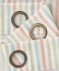 Close-up of Candy Stripe Linen Curtains For Kids Room Two Panels 96 Inch Length with grommets and multicolor stripes on linen blend