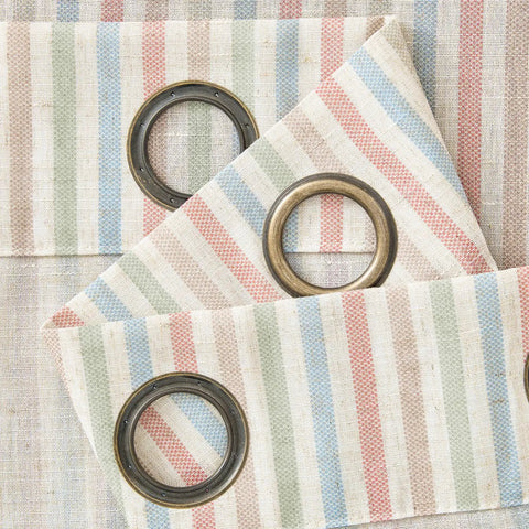 Close-up of Candy Stripe Linen Curtains For Kids Room Two Panels 96 Inch Length with grommets and multicolor stripes on linen blend