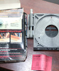 Step Up Your Shop Game With This Badass Biscuit Joiner Router Converter Kit next to its packaging and instructions on a wooden surface.