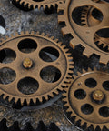 Close-up of bronze gears from Steampunk Wall Clock With Moving Bronze Gears And Rustic Wooden Frame Perfect For Farmhouse Decor.