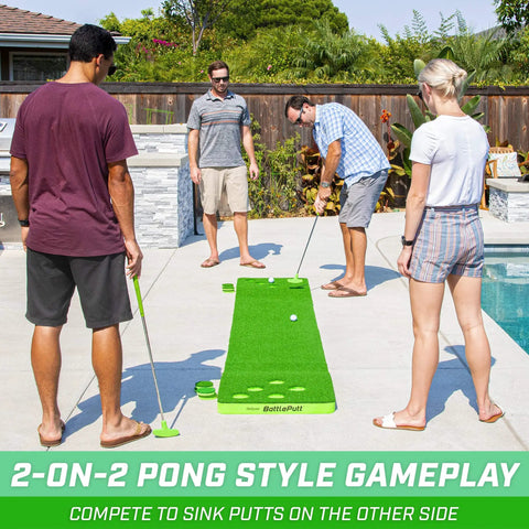 Four people enjoying BattlePutt 11 Ft Backyard Putting Green Pong Style Golf Mat with two putters and balls by a poolside.