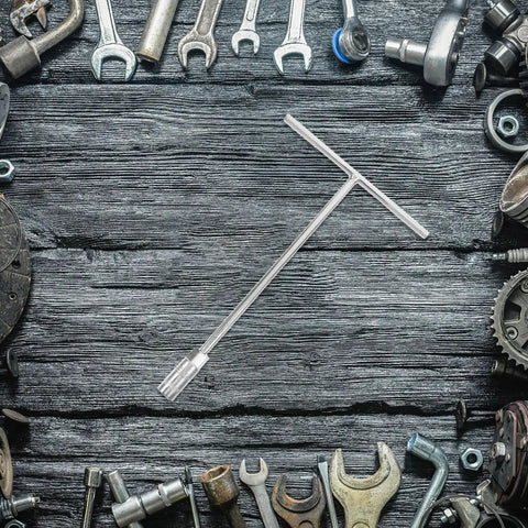 Heavy Duty T Handle Socket Wrench Set For Bike And Motorcycle Maintenance With Thick Hexagon Shaft and Slick No Slip Grip on a wooden surface.