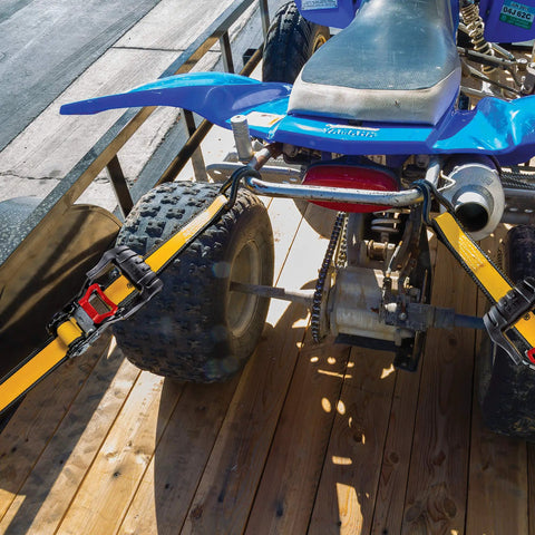 Heavy Duty Ratchet Tie Down Straps 4 Pack 16 Ft By 1.5 Inches securing an ATV on a trailer with rubber soft J hooks.