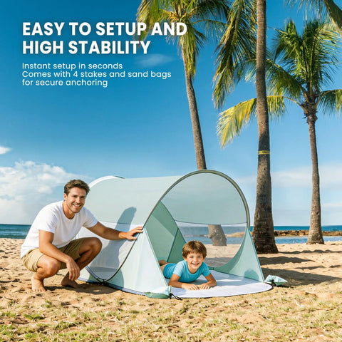 Go To Easy Pop Up Beach Shelter For 1 To 2 People With UPF Fifty Plus UV Protection Set Up In Seconds on a sunny beach with palm trees.