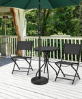 Beefy Heavy Duty Outdoor Umbrella Base For 1.5 To 1.9 Inch Poles 26.5 Lb Resin And Iron Construction on patio with furniture