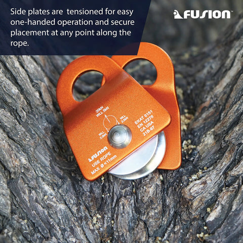 Close-up of Micro Aluminum Side Swing Pulley With Cheeks For Backyard Zipline And Trolley 20kN Single Pulley on tree