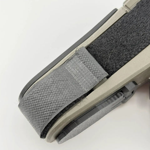 Close-up of Storage Plug For SBA3 Pistol Brace With Hinged Clip In Lid, showing secure grip and durable positive retention closure.