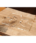 Straight Up Butterfly Router Inlay Template Machined From Thick Clear Acrylic on wood background for woodworking projects.