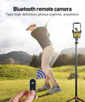 Golfer using 62 Inch Extendable Phone Tripod And Selfie Stick For Golf Training With Wireless Remote And Universal Phone Holder