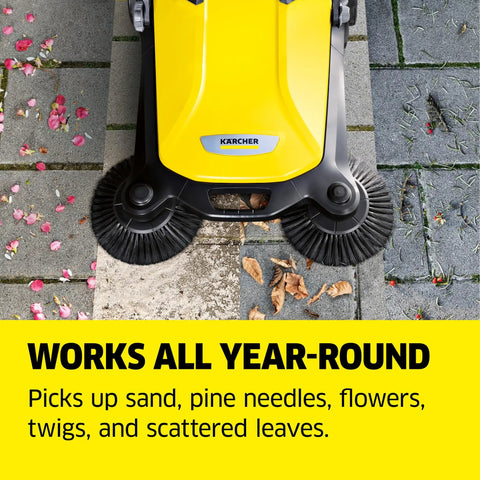 Walk Behind Outdoor Push Sweeper S 4 Twin clearing leaves from stone path